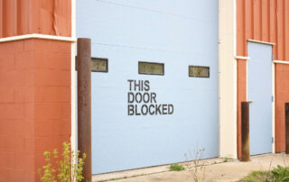 Herrajes para puertas correderas industriales - Martín Vecino